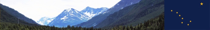 Mountains with the state flag of Alaska.