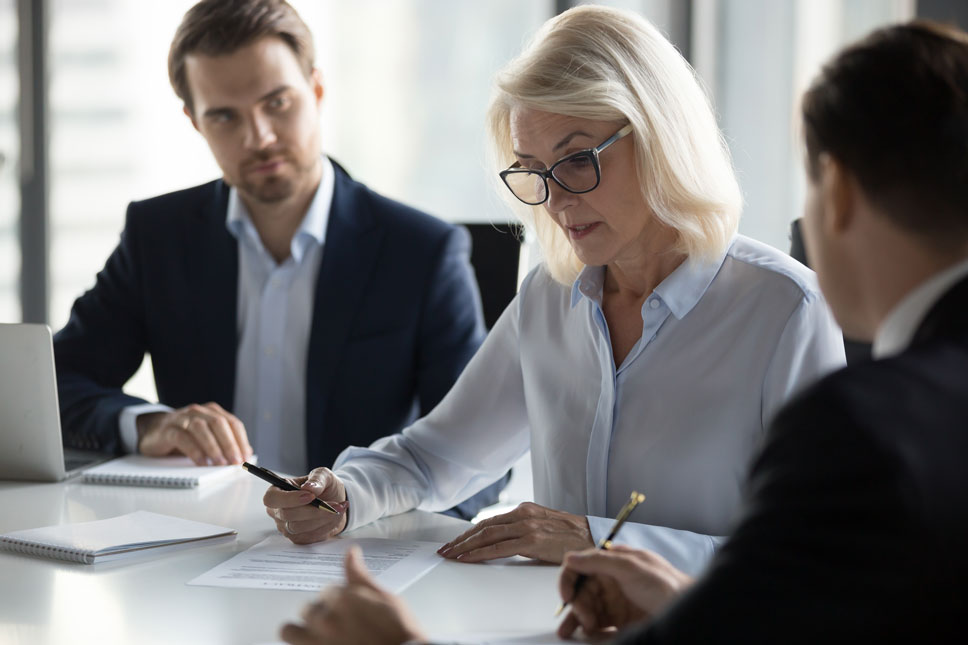 Identity-Verification-solutions notaries checking documents.