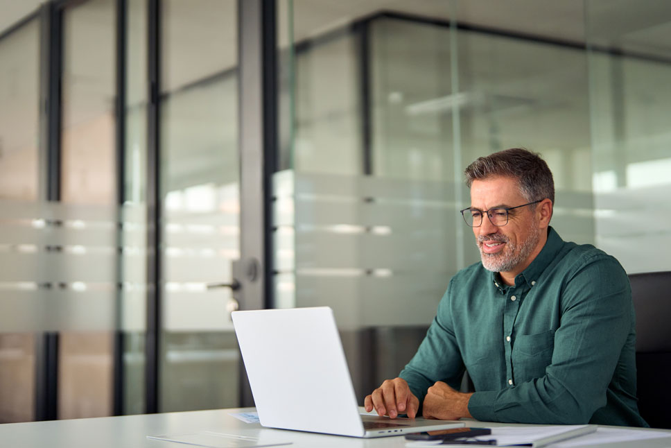 Pre-employment-Screening-remote-ID-verification man checking candidate's ID remotely.